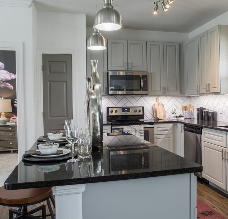 Spacious kitchen with granite countertops