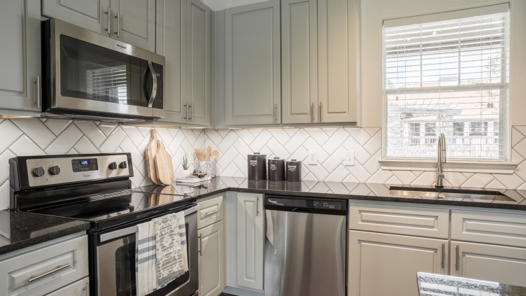 Kitchen cabinetry and stainless steel appliances